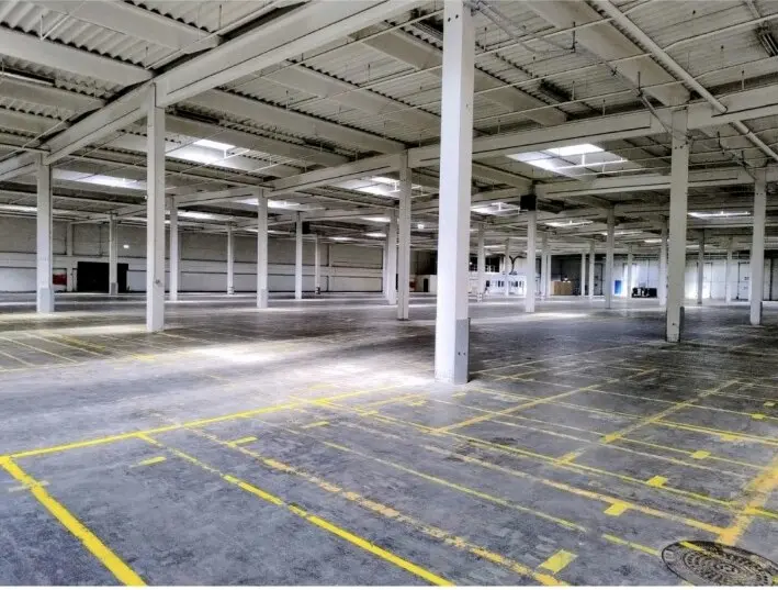 The structure and interior of a commercial building documented during ACED Miljø’s work.